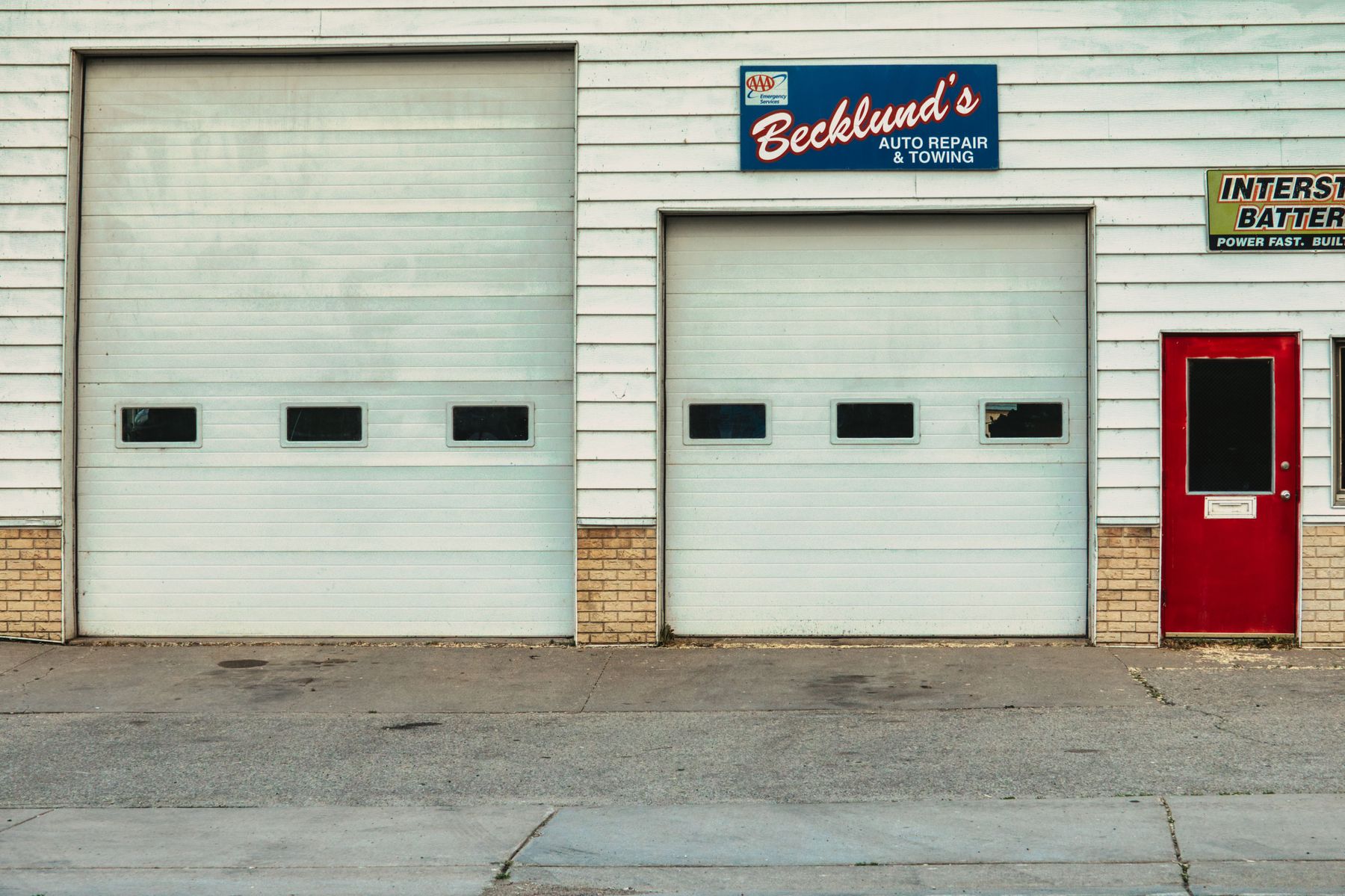 Row of commercial roll-up garage doors